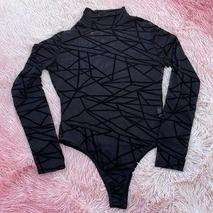 black turtleneck bodysuit